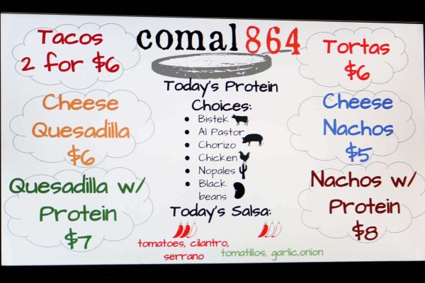 GVL A menu board for comal 864 listing tacos 2 for $6, cheese quesadilla $6, quesadilla with protein $7, tortas $6, cheese nachos $5, nachos with protein $8, and protein and salsa options.