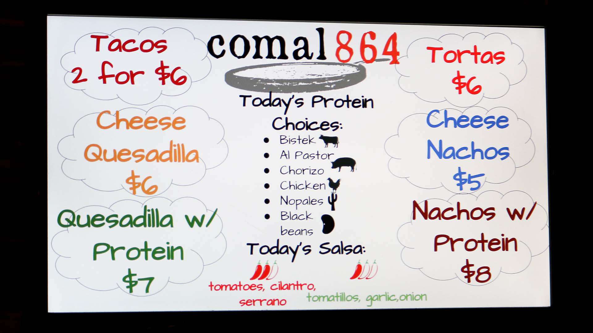 GVL A menu board for comal 864 listing tacos 2 for $6, cheese quesadilla $6, quesadilla with protein $7, tortas $6, cheese nachos $5, nachos with protein $8, and protein and salsa options.
