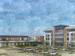 GVL Architectural rendering of Greenville hospital, a modern Novant Health facility with large windows and multiple stories, set against a blue sky, with a parking lot and several cars in the foreground.